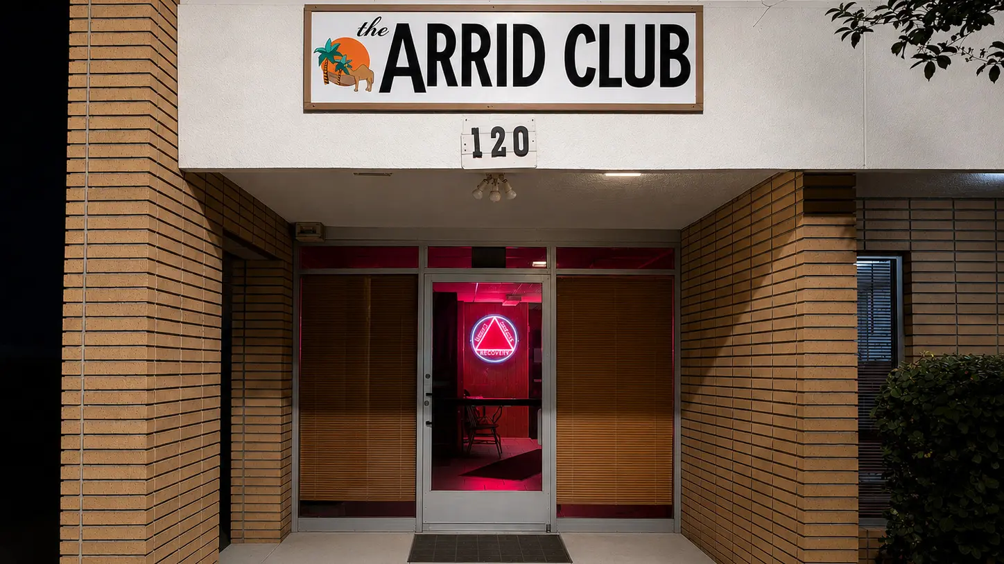 The Arrid Club exterior at night — 120 S. Harvard St, Hemet, CA